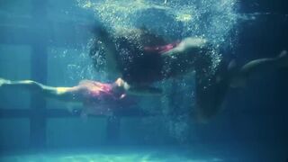 Lesbians and solo girls make out underwater